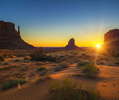 Horizontal view of sunrise at Monument Valley